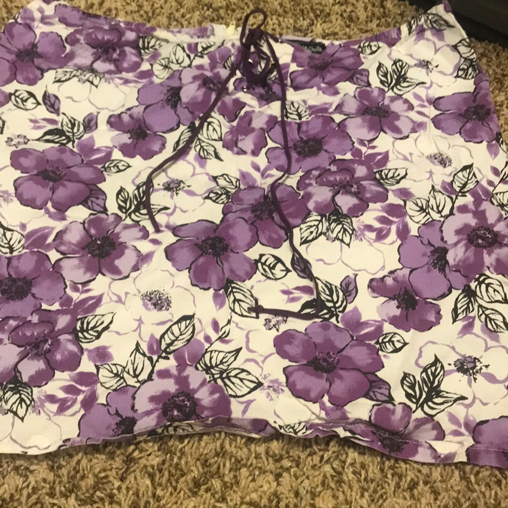 Black, purple, and white floral mini skirt